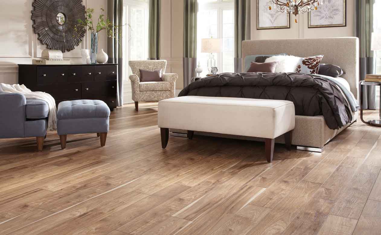 wood look tile flooring in bedroom